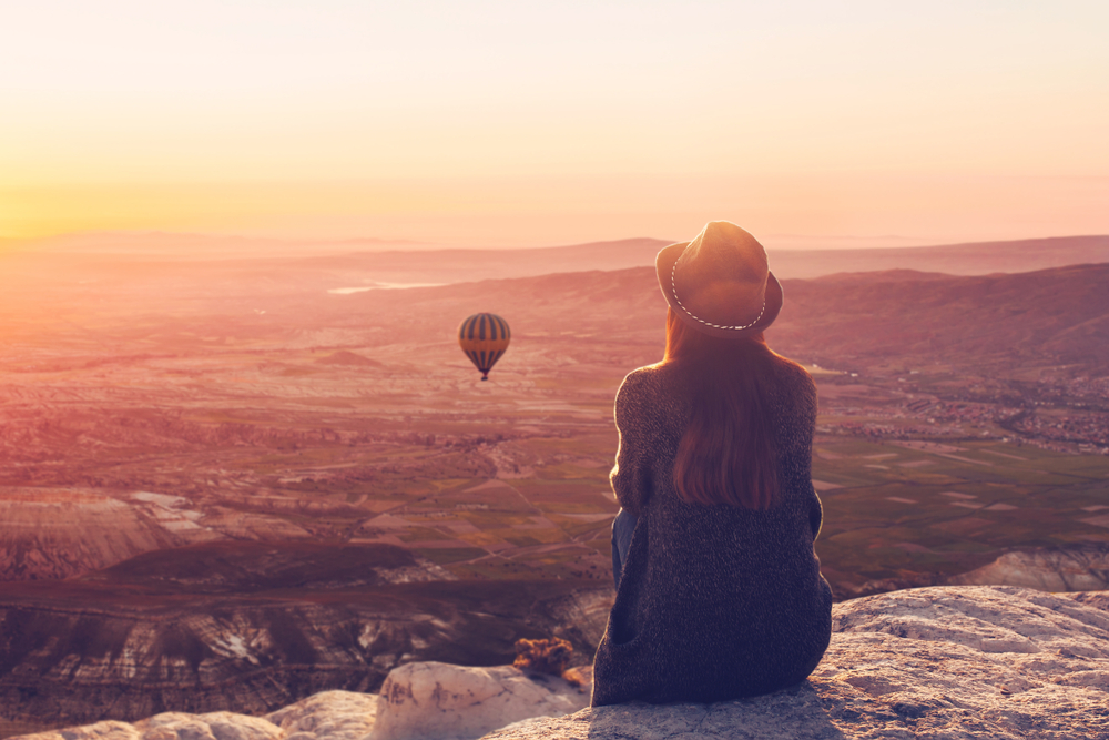 Woman contemplating life, celebrating life, loving life.