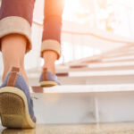 Boost Motivation, Evidence-Backed Strategies to Boost Motivation. Person walking up stairs, concept resilience